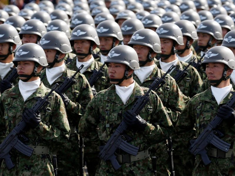 Members of Japan's Self-Defence Forces' airborne troops stand at attention during the annual SDF ceremony at Asaka Base. Photo: REUTERS/Kim Kyung-Hoon
